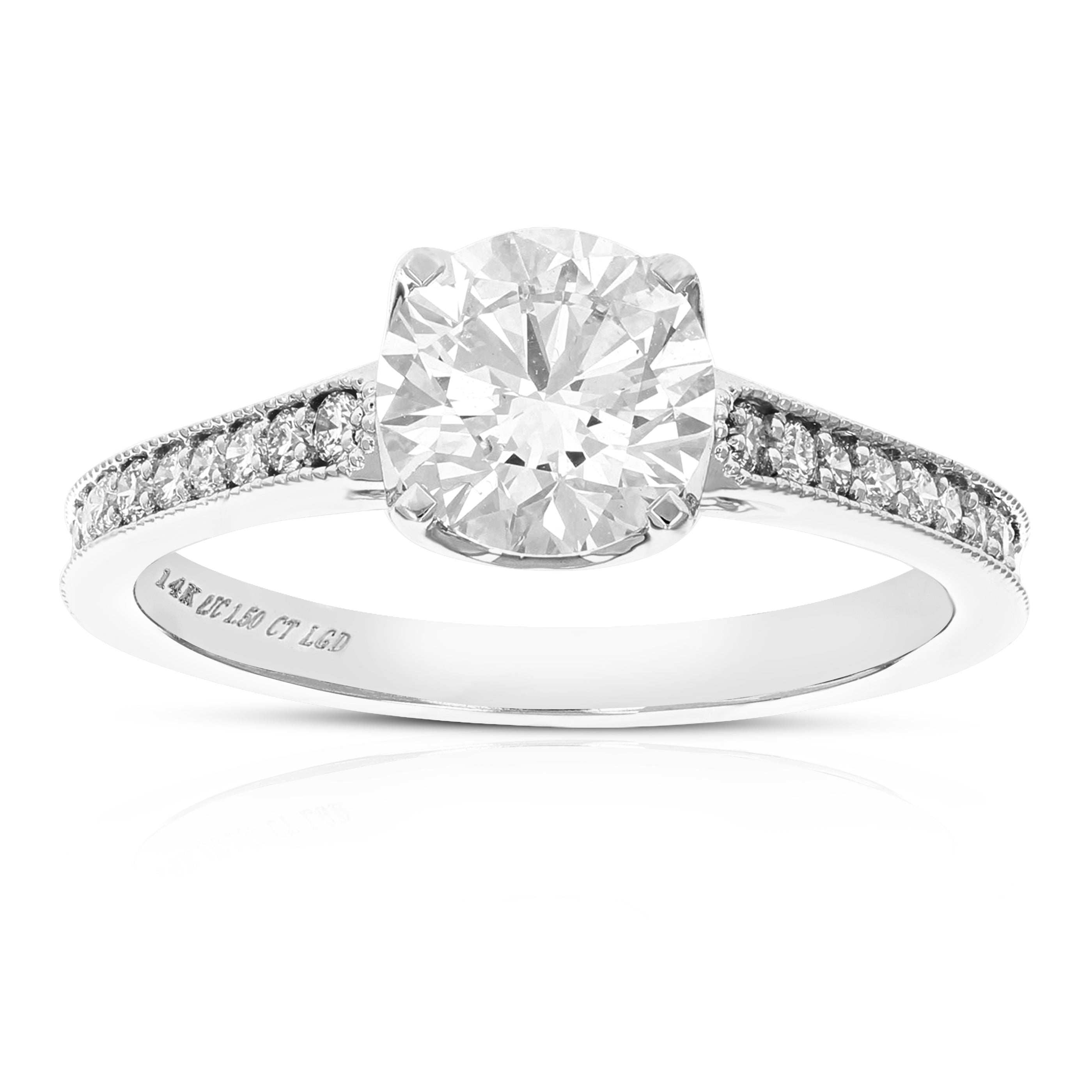 Four Prong Diamond Solitaire Ring