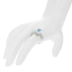 1 cttw Blue Topaz and Diamond Ring .925 Sterling Silver with Rhodium Oval Shape