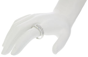 1/6 cttw Diamond Buckle Ring in .925 Sterling Silver with Rhodium Plating Round